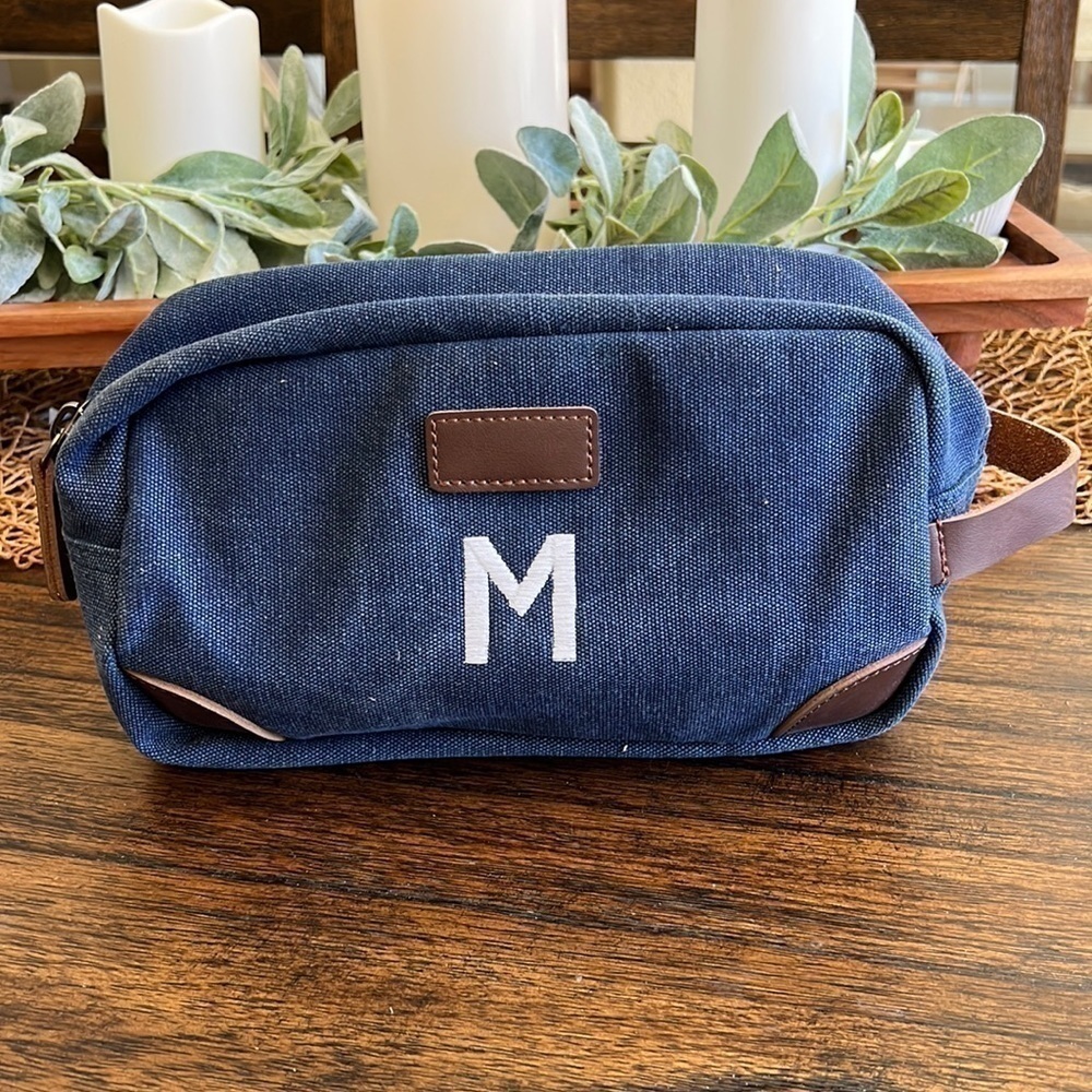 embroidered M toiletry bag